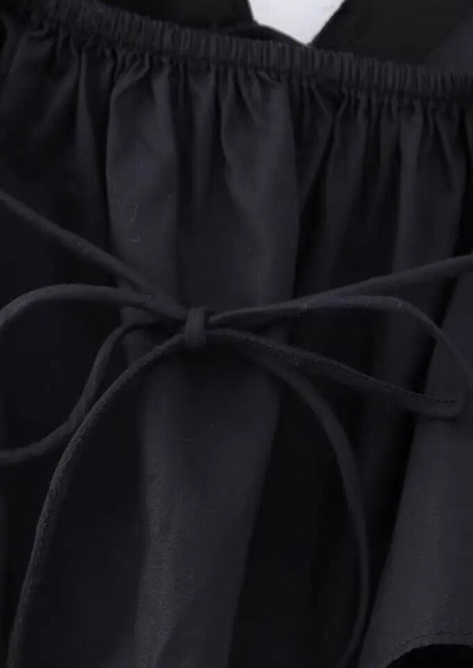 Blomstertop med Peplum og Halterneck