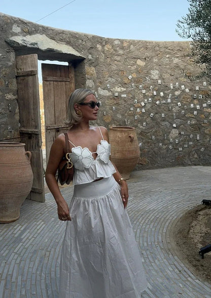 Blomstertop med Peplum og Halterneck