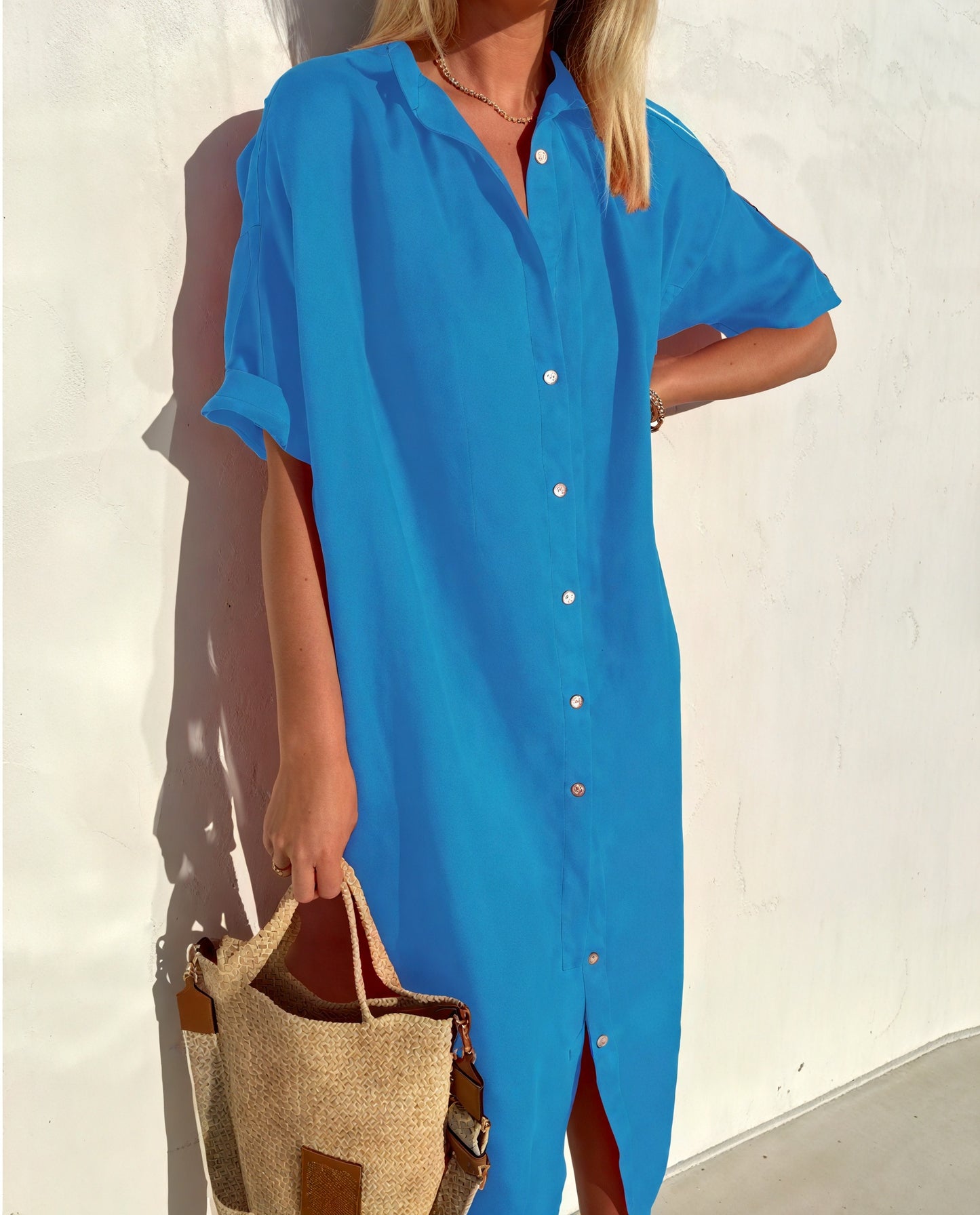 Elegant sommerkjole med afslappet silhuet