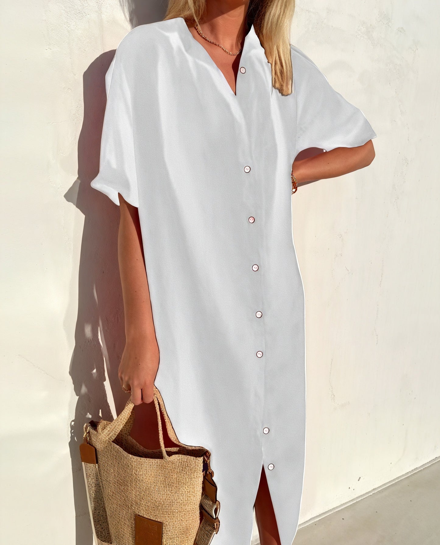 Elegant sommerkjole med afslappet silhuet
