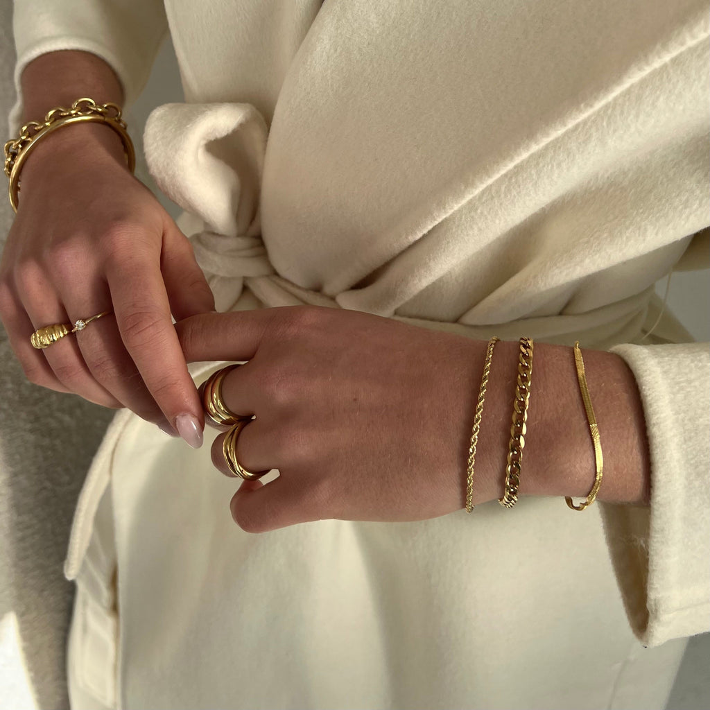 Twistet Armbånd med Justerbar Kæde