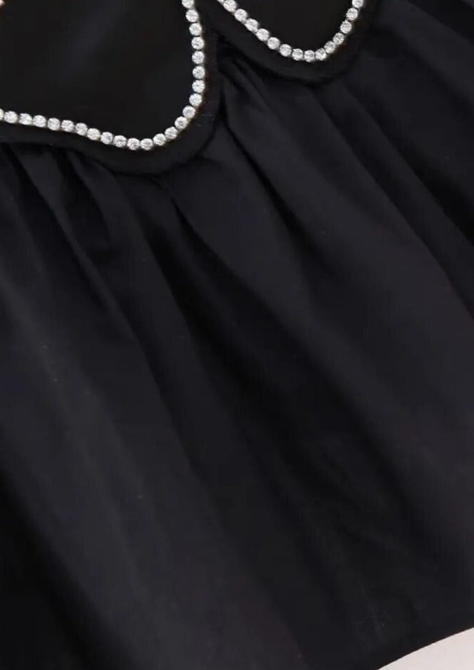 Blomstertop med Peplum og Halterneck