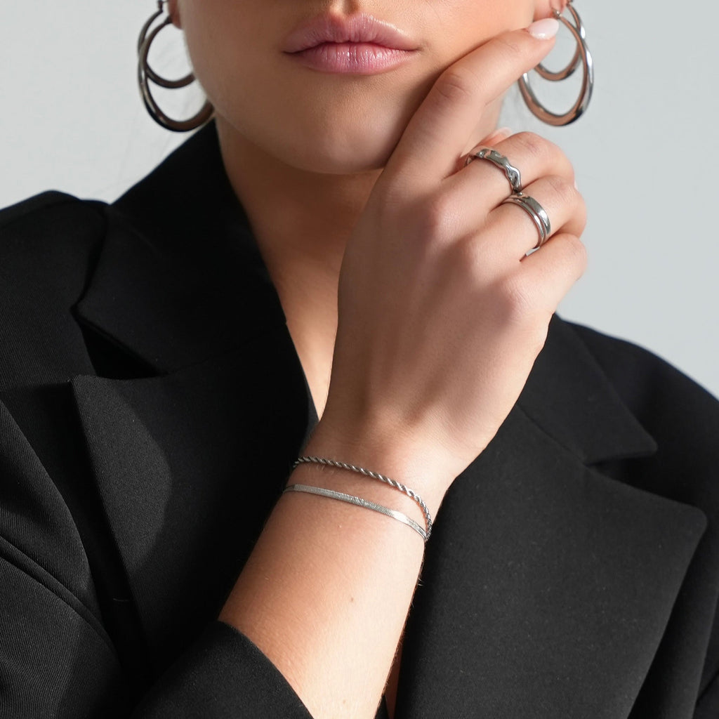 Twistet Armbånd med Justerbar Kæde